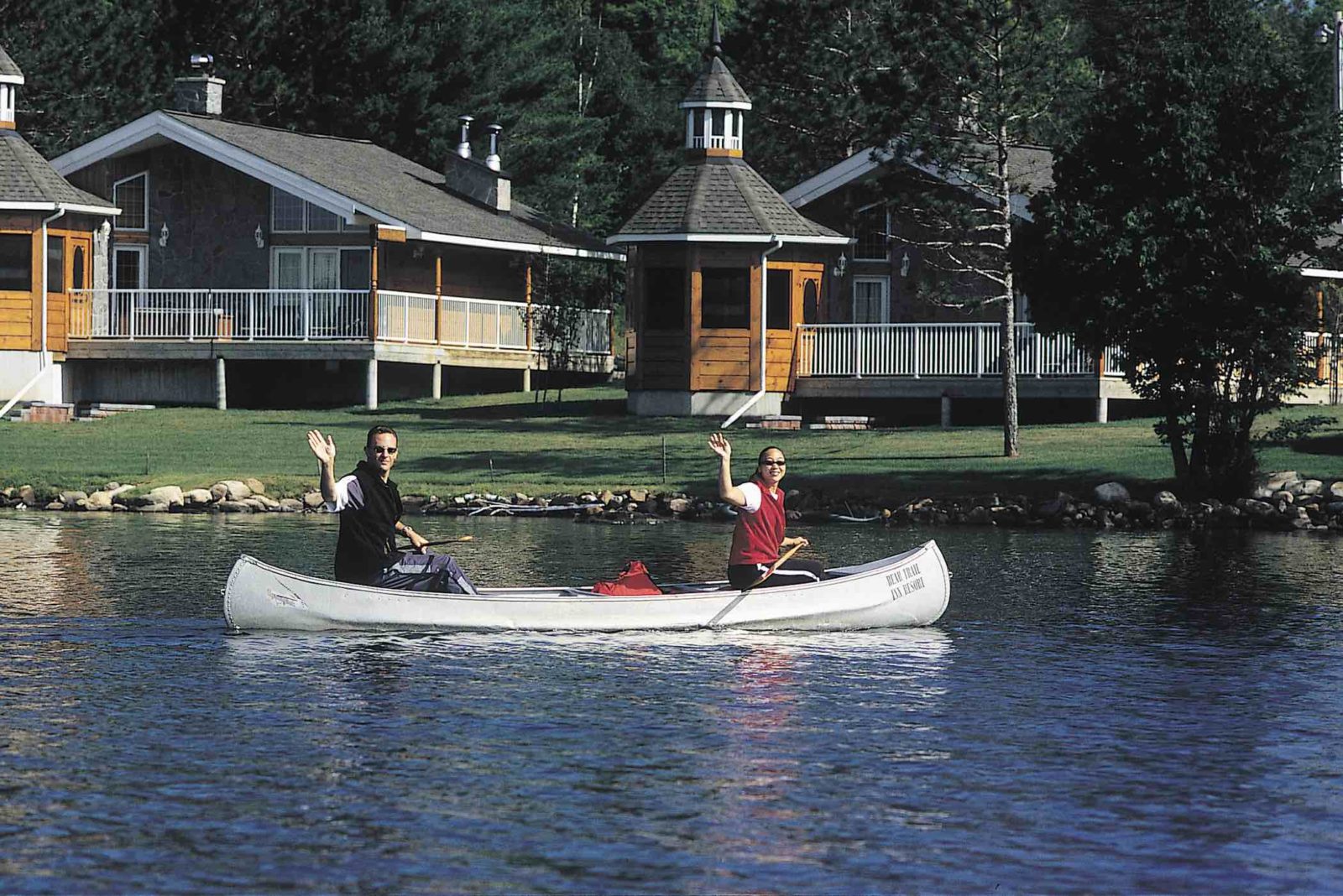 Couples Resort with couple in canoe