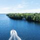 Luxury Island Cottage in Muskoka boat heading to boathouse